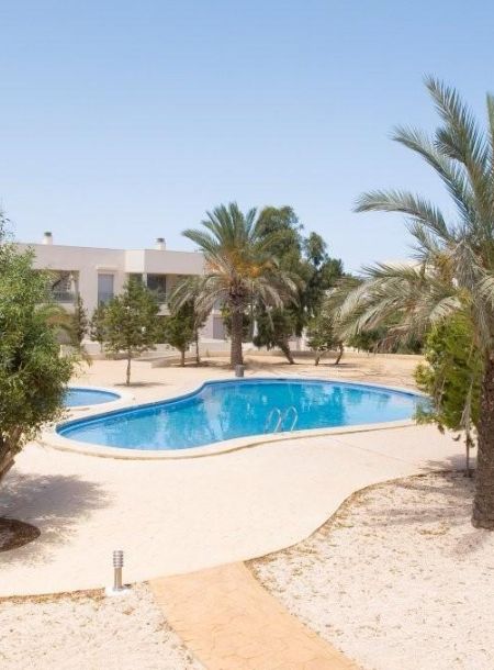 DUPLEX IN A RESIDENTIAL COMPLEX WITH A COMMUNAL POOL AND TWO PARKING SPACE